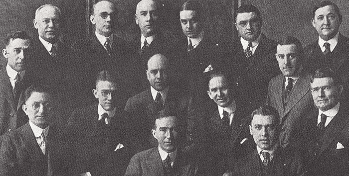 A group of men in suits and ties.